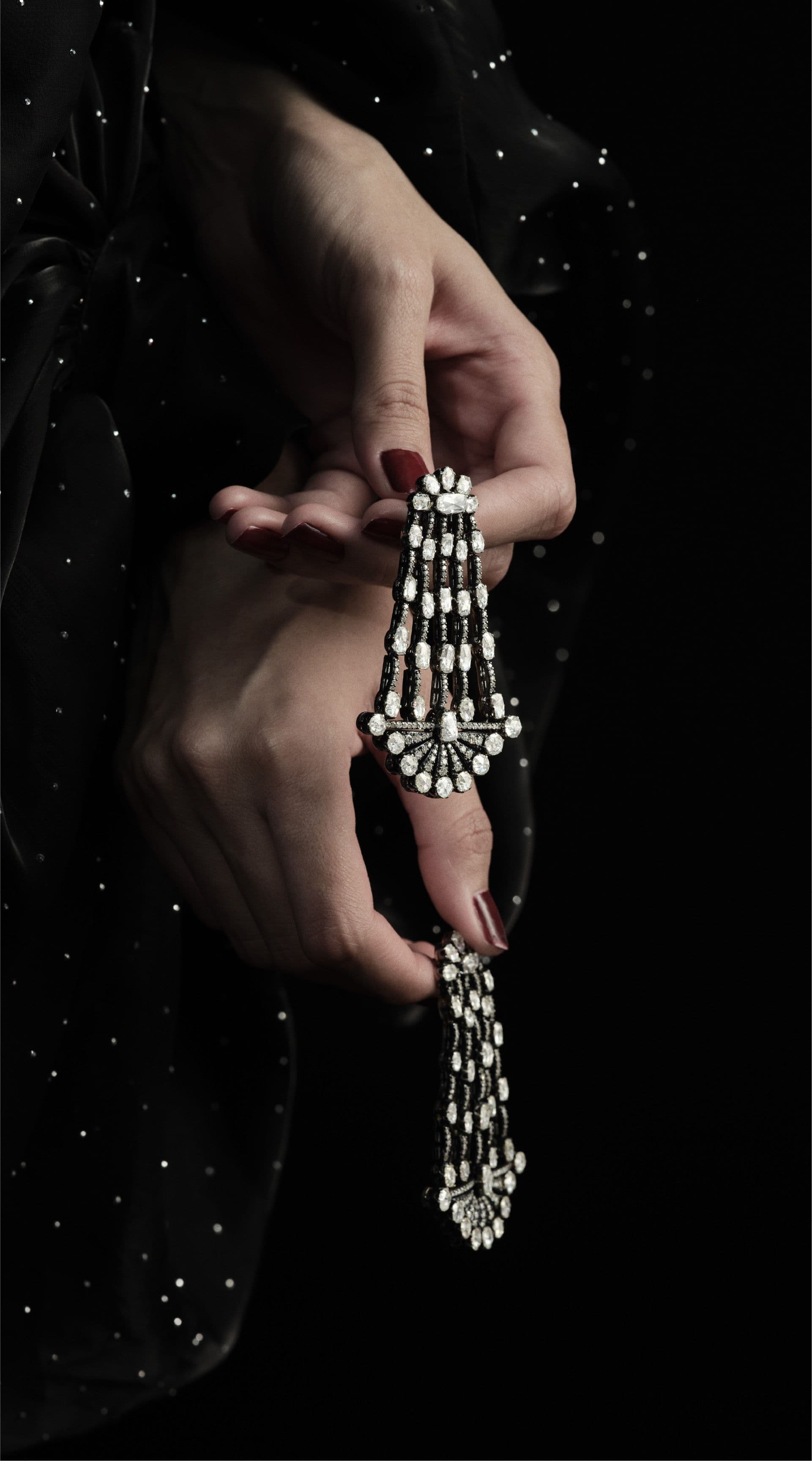 Diamond earring resting in the hand