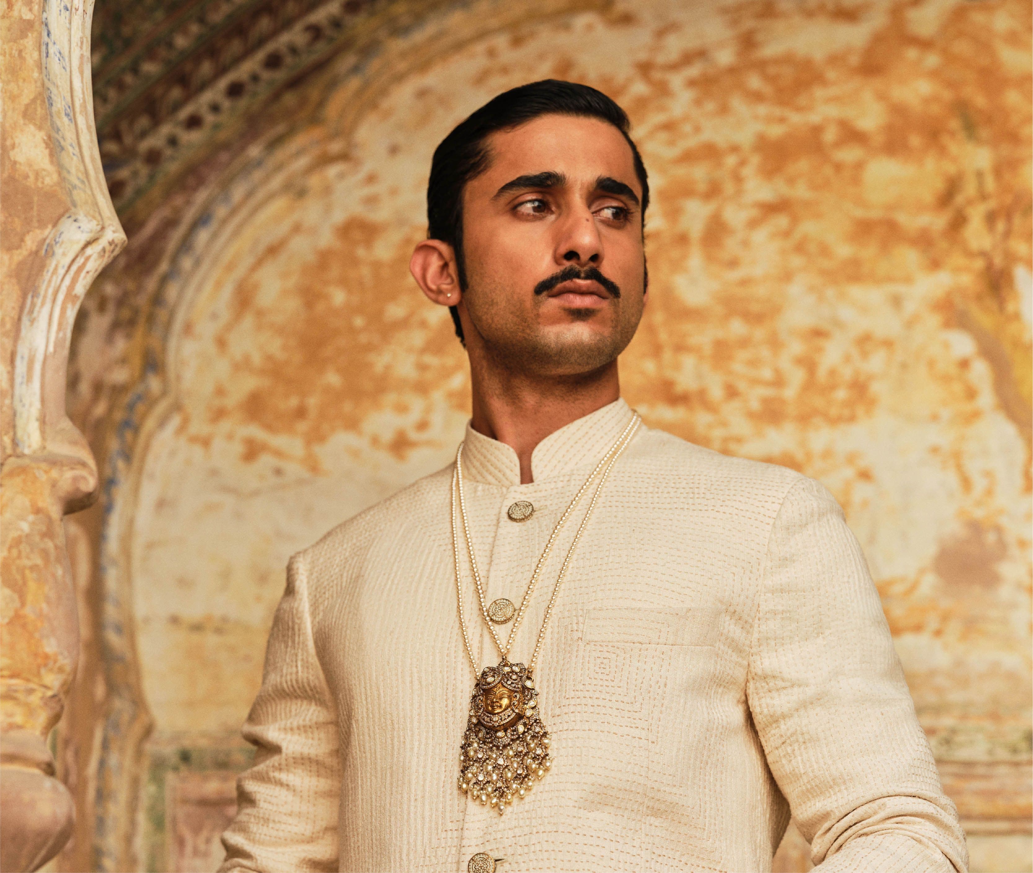 Solo portrait in cream sherwani